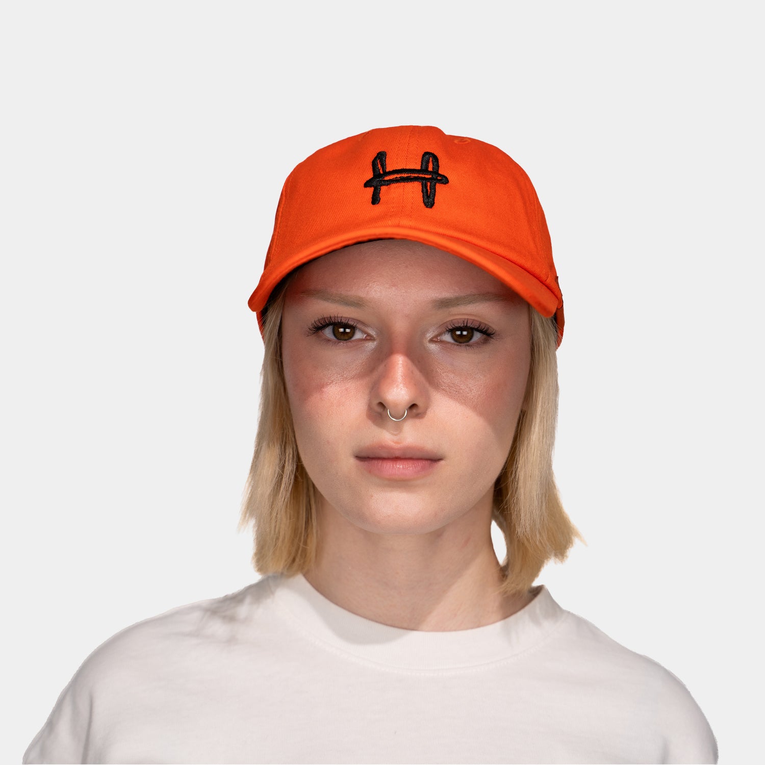 a cap with an h on it