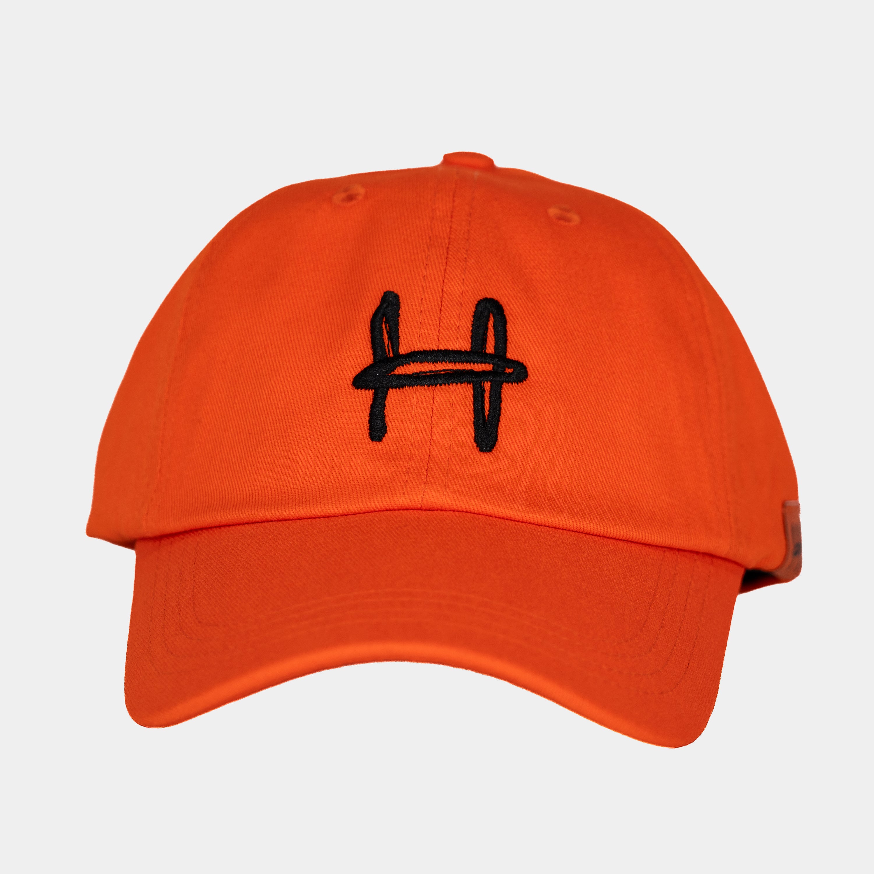 a cap with an h on it