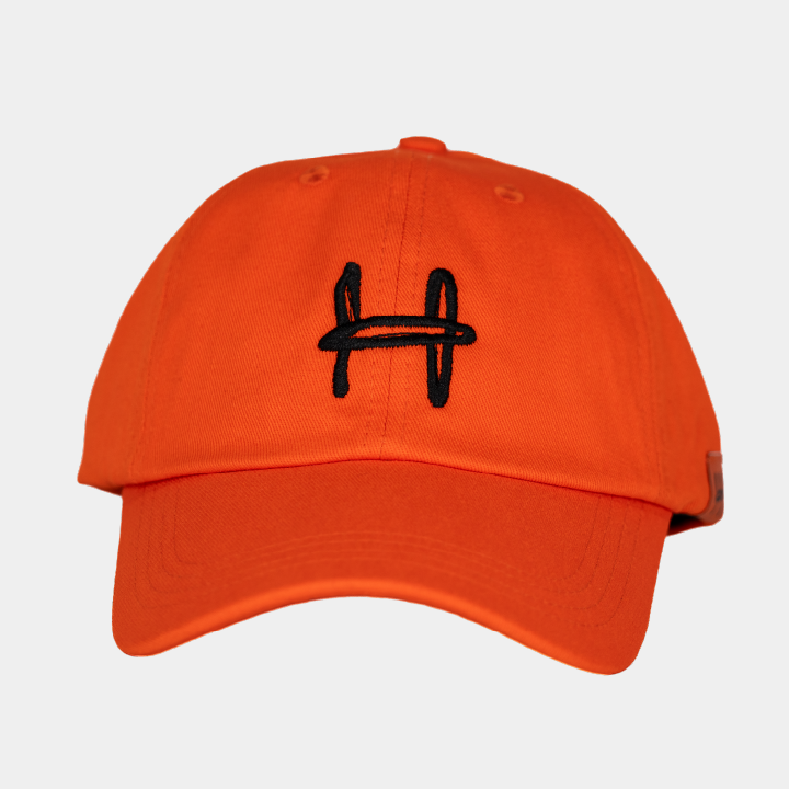 a cap with an h on it